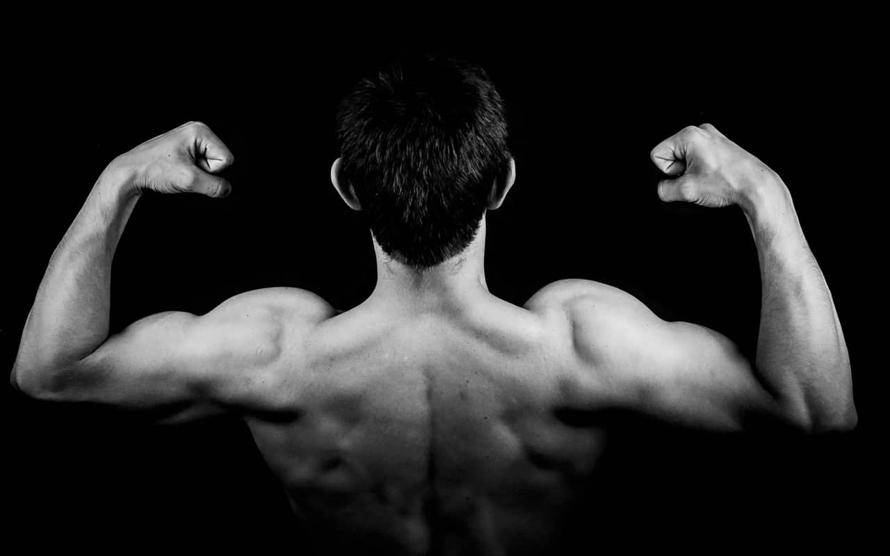 a man is showing his muscles