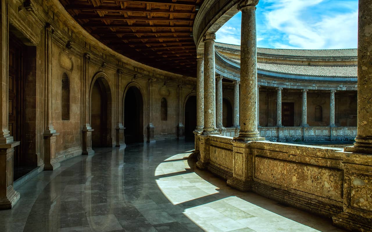 an open concept building with pillars