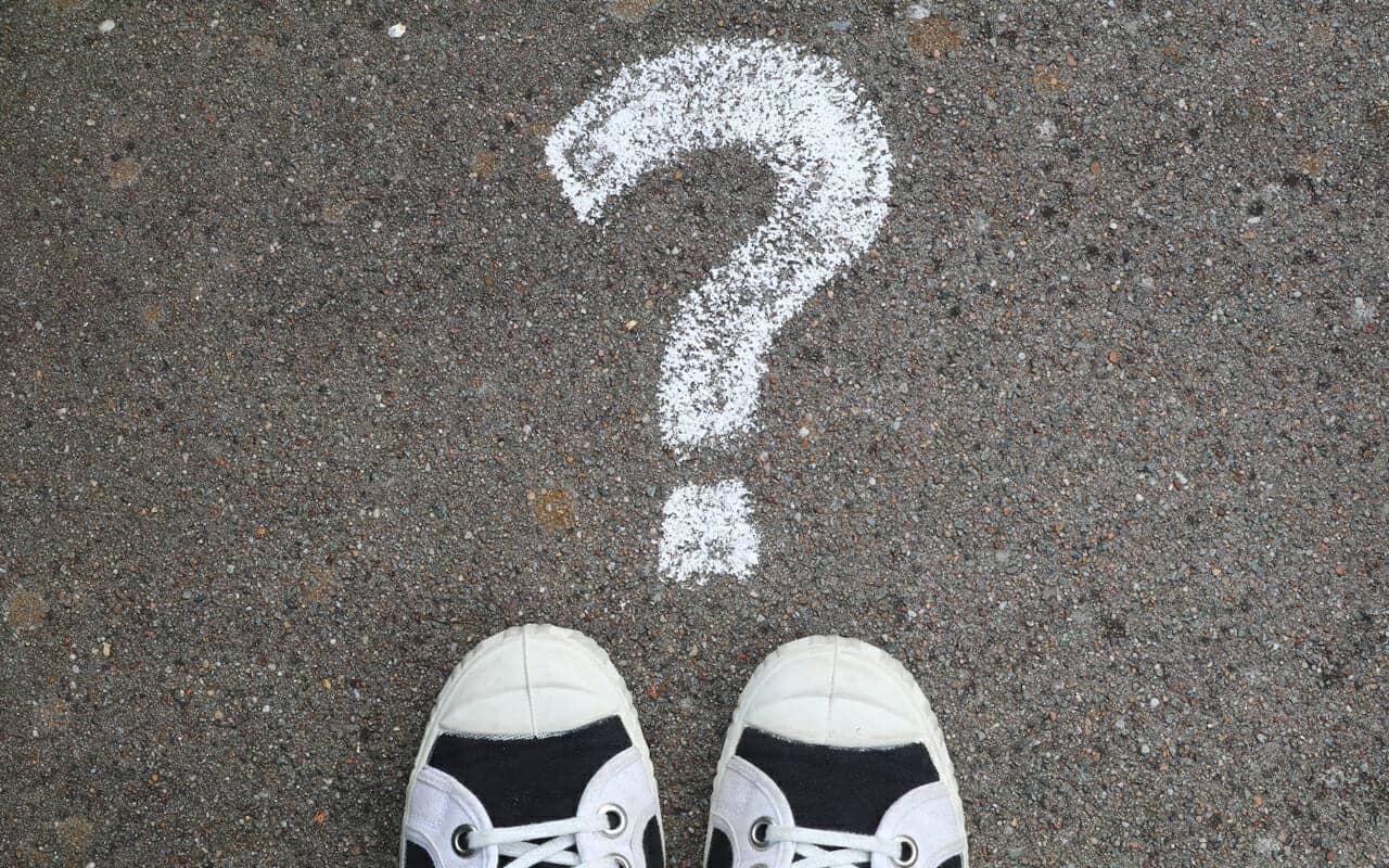 a question mark on the ground