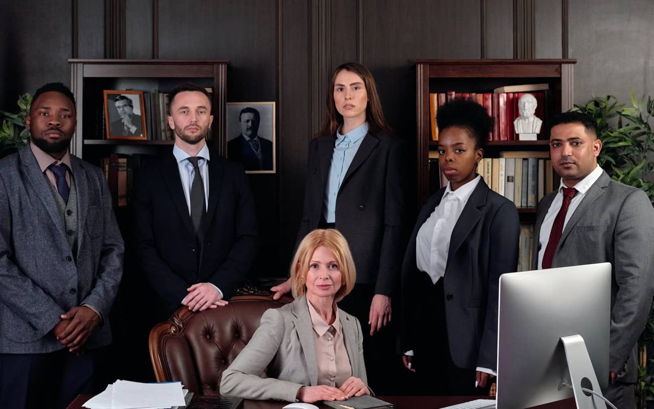 a successful manager with her team