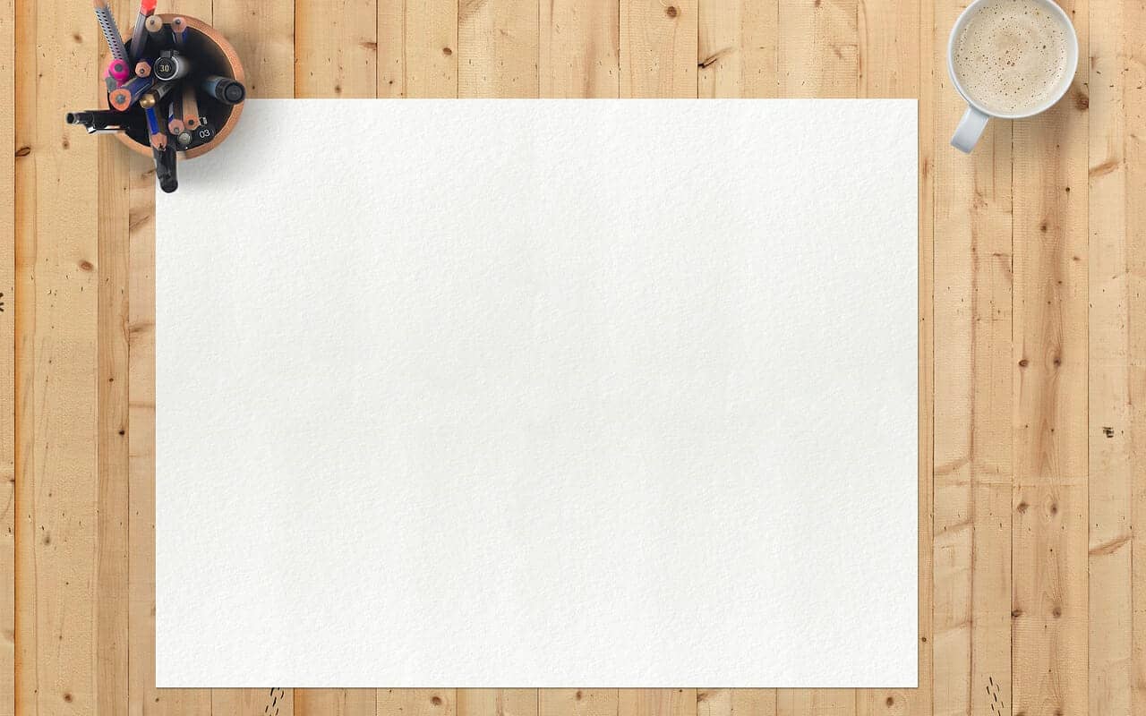 a white paper and colour pencils