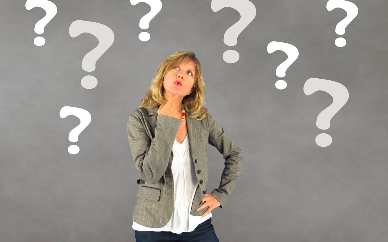 a woman has lots of questions