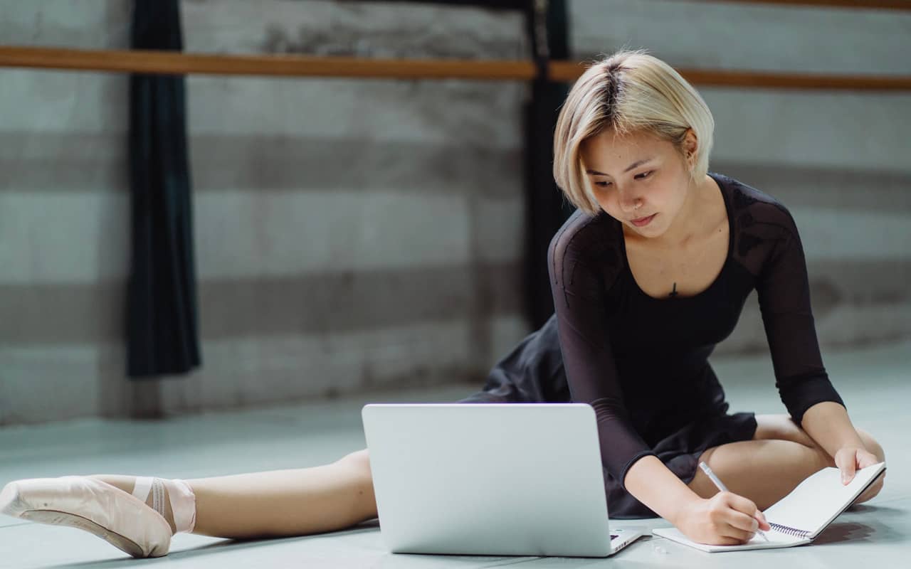 a woman is learning dance
