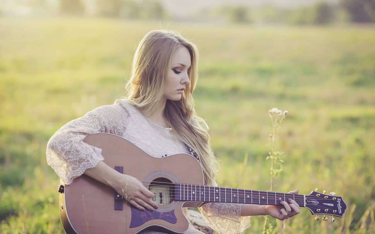 a woman is learning music