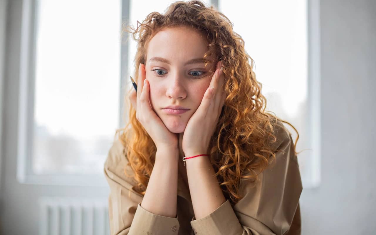 a woman is struggling with something