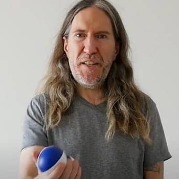 Anthony Metivier demonstrating a neurobic exercise for better memory with a juggling ball