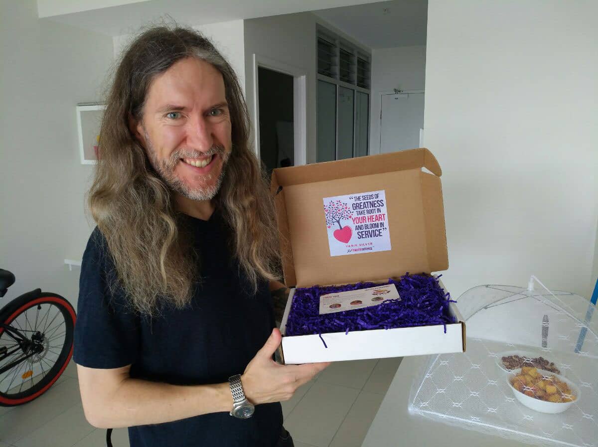 Anthony Metivier with a copy of Evolved Enterprise