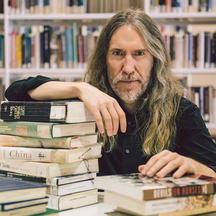 Anthony Metivier with books