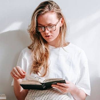 how to increase memory power feature image of a woman with a book