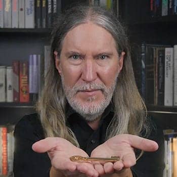 Mnemonic devices feature image with Anthony Metivier holding a key to represent how memory techniques unlock memory ability