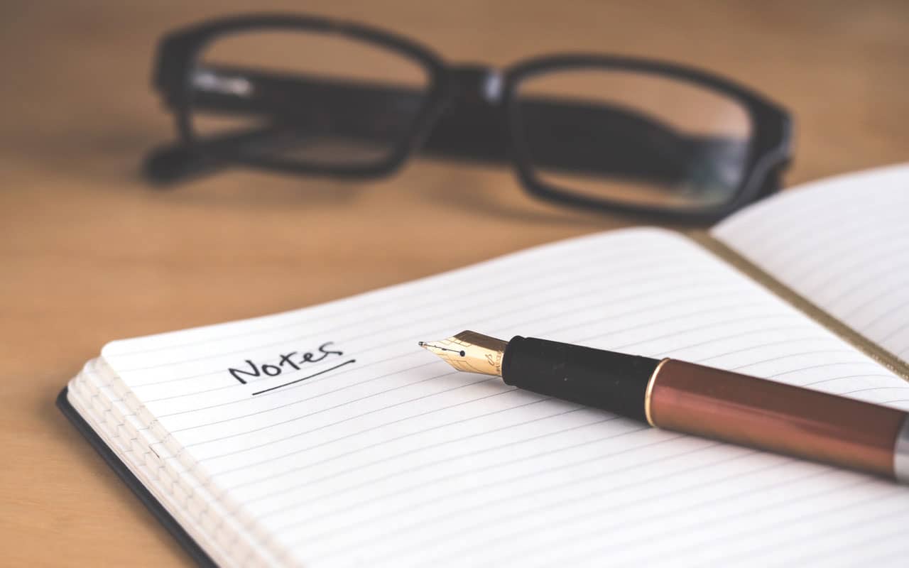 A notebook and pen, where you use your working memory to take notes after class ends.