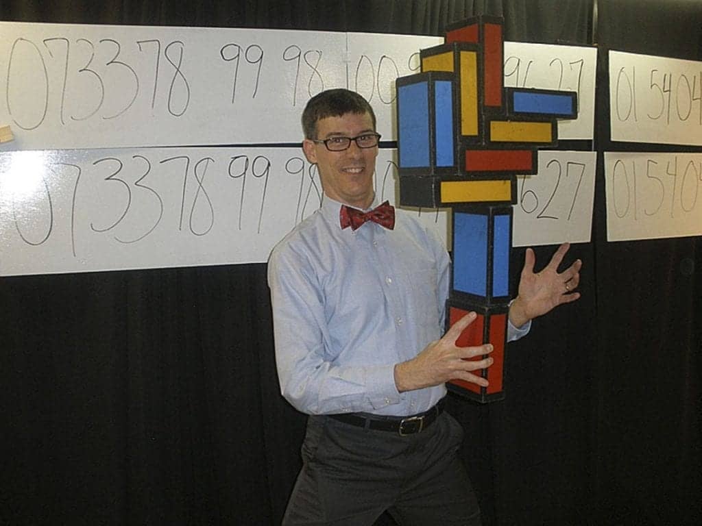 Brad Zupp teaching memory techniques at a school presentation