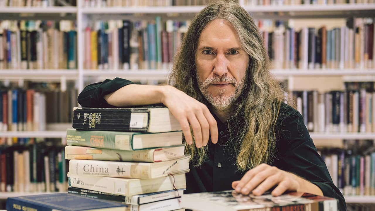 Anthony Metivier with books