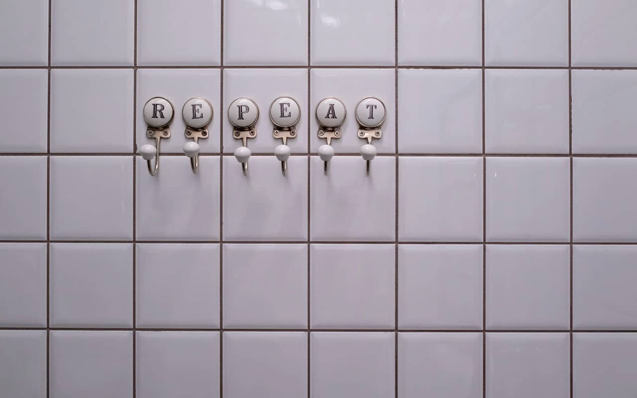 repeat stickers on white wall