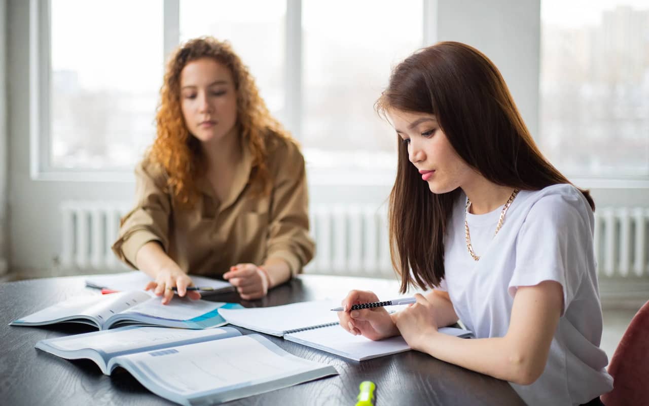 two women are learning